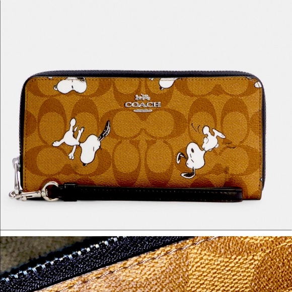 Coach Handbags - Coach x peanuts  ( snoopy) zip around wallet limited edition new / tags sold out